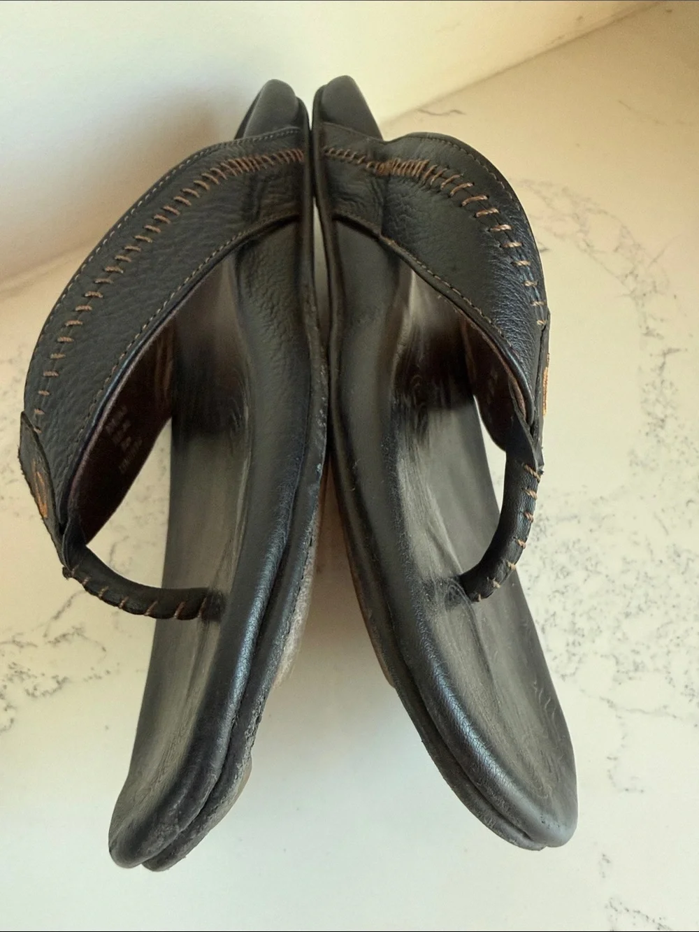 OluKai Men's Hiapo Leather flip-flops Sandals Black Whipstitching Moko Tattoo
